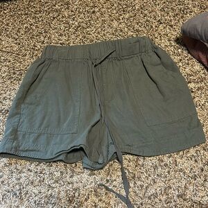 - navy green shorts